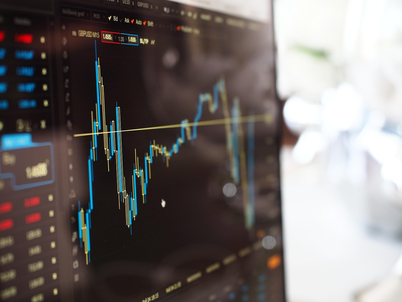 A digital dashboard showing an upward trending graph and financial performance indicators.