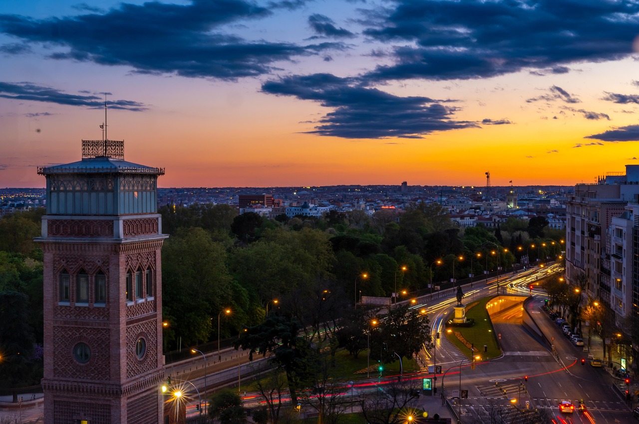 A clean city path leading towards a bright sunset representing a clear financial future.