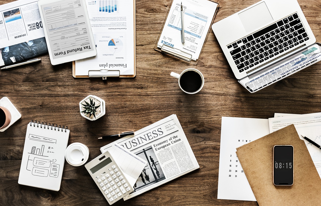 A modern laptop on a clean desk representing the desktop banking experience.