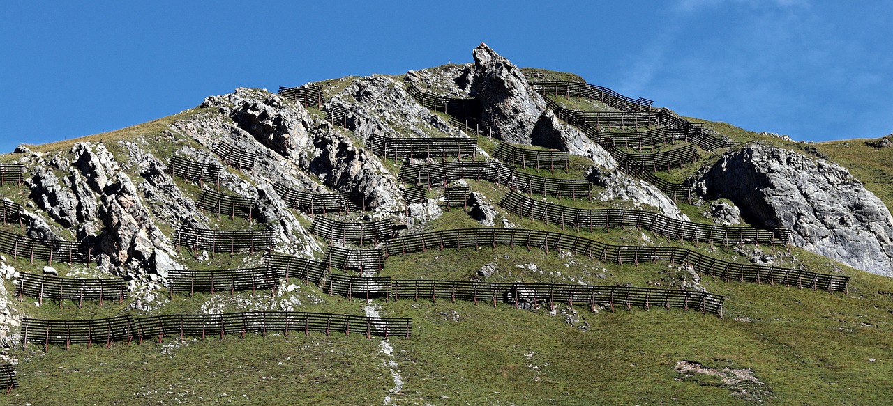 A snowy mountain landscape representing the scale and momentum of debt payoff methods.