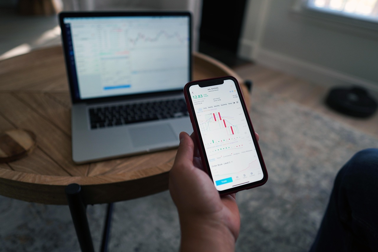 Close-up of financial graphs and data on a screen representing debt analysis.