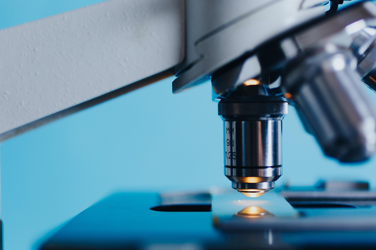 A dental student working in a modern clinical laboratory environment.