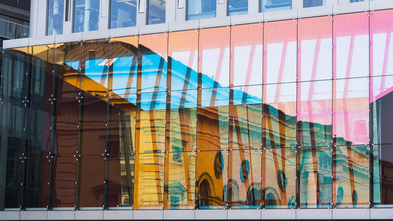 A sleek modern office building front representing a verifiable physical business nexus.