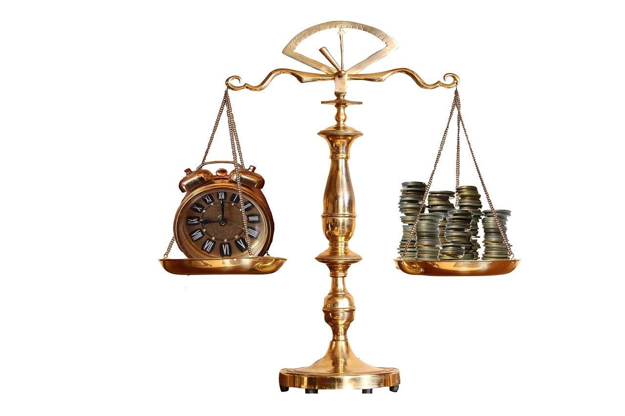 A balance scale with gold coins on both sides