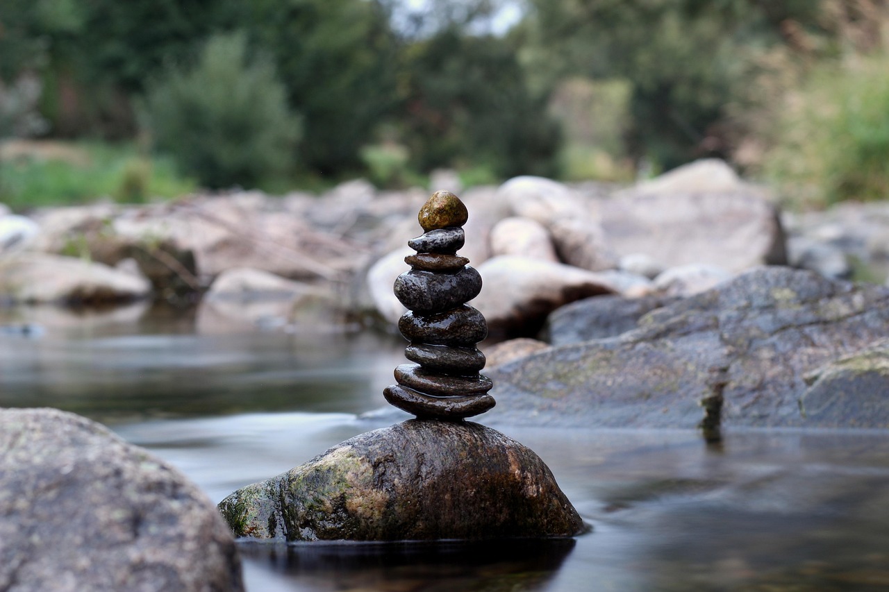 Balanced stones stacked neatly representing a stable asset allocation.