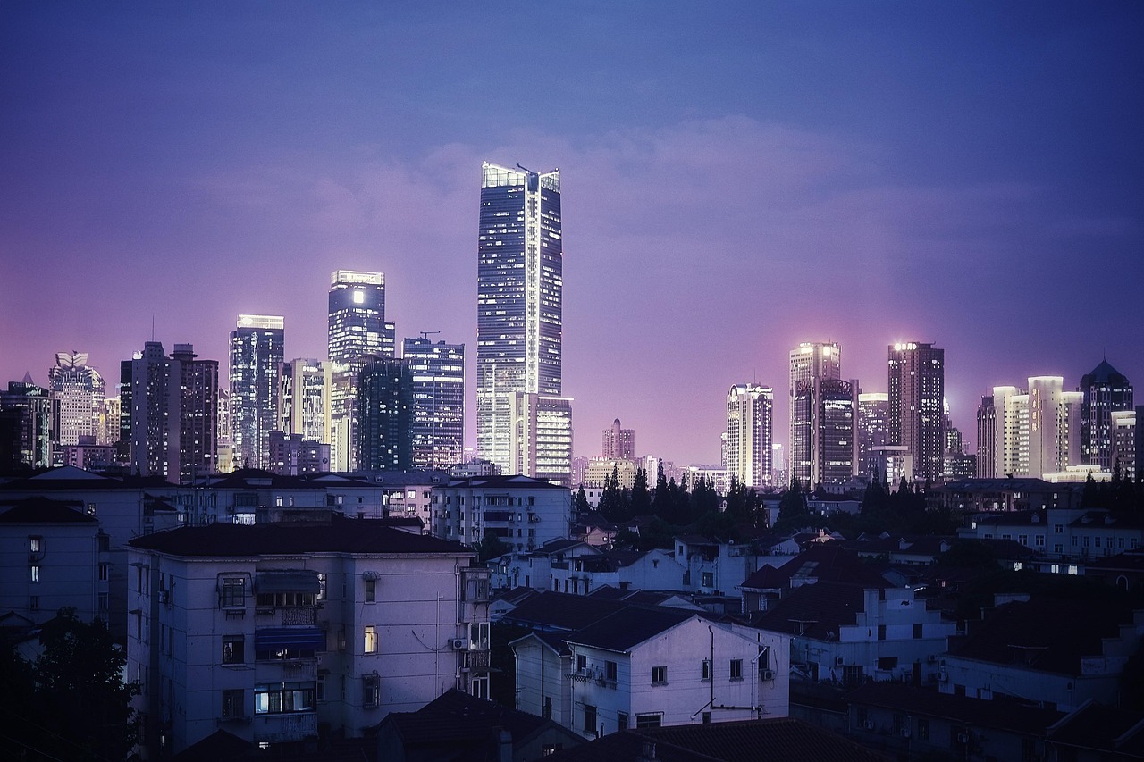 A wide view of a modern city skyline representing total market diversity.