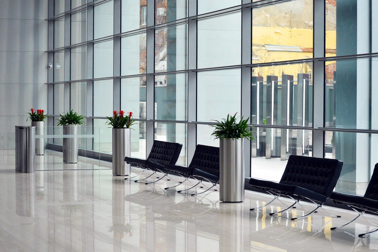 A clean and modern corporate office lobby representing a high-level banking headquarters.